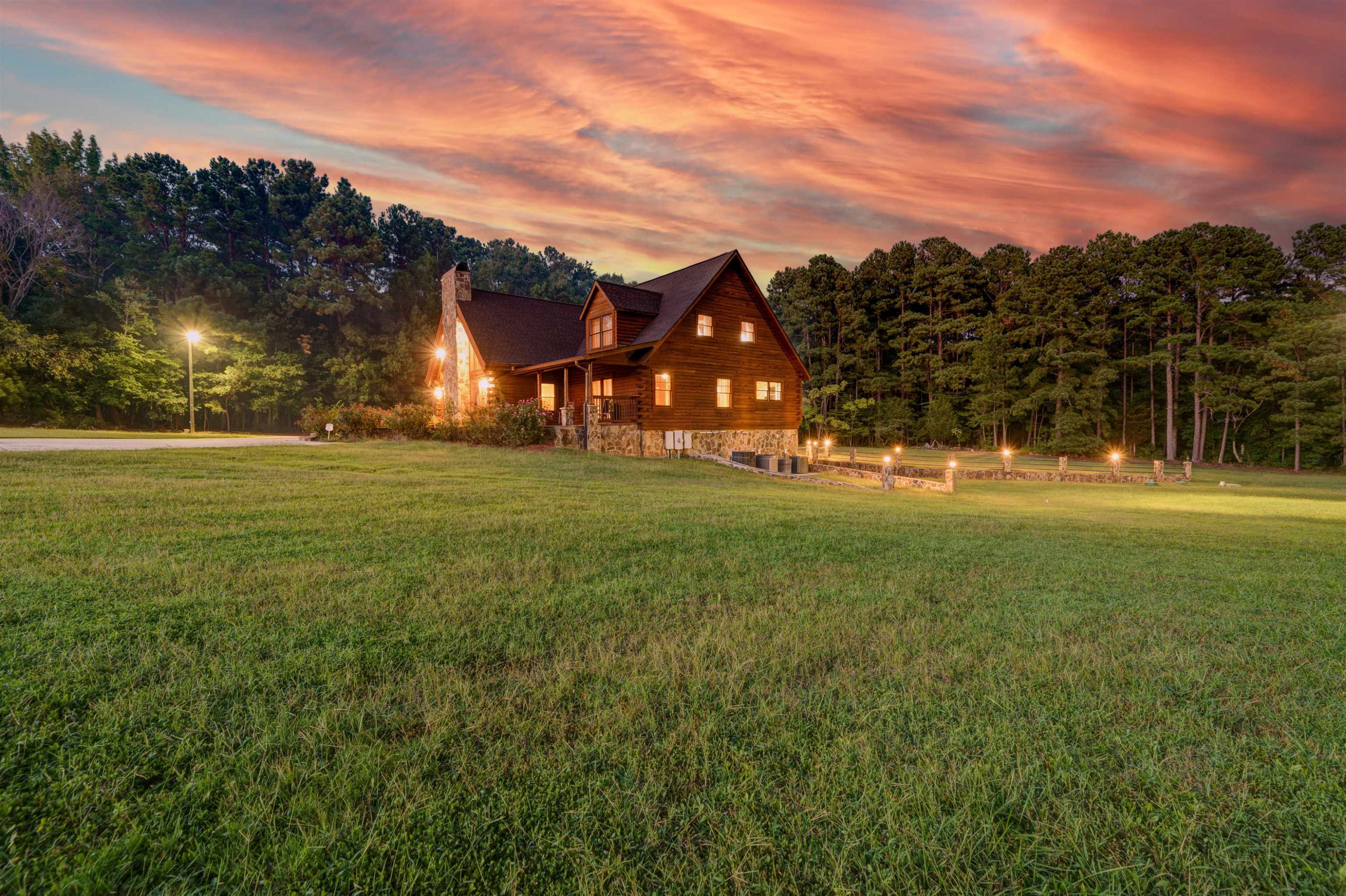 1039 North Chavis Road Kittrell, NC 27544 - Photo 47 of 53 a view of a big yard with table and chairs