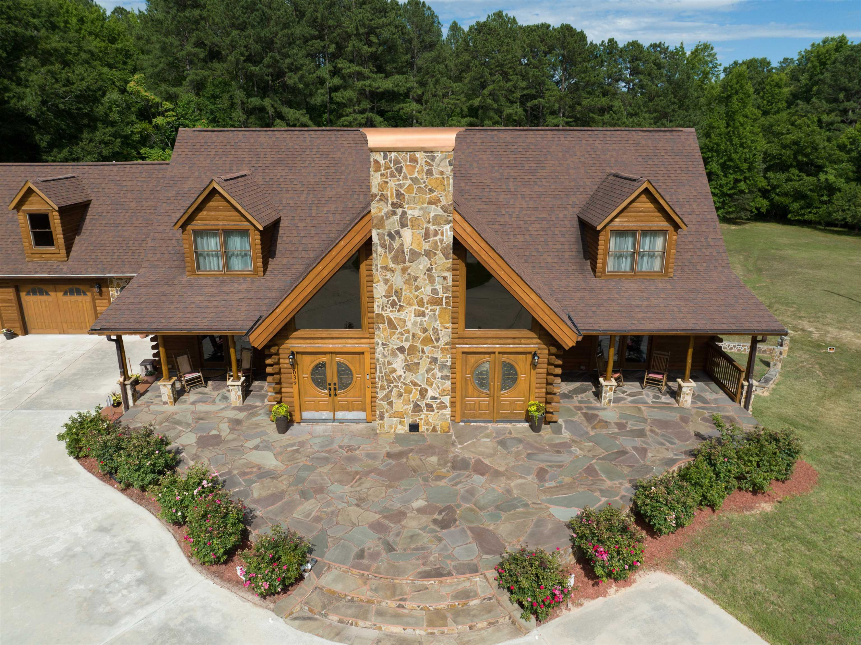 1039 North Chavis Road Kittrell, NC 27544 - Photo 5 of 53 an aerial view of a house with large trees