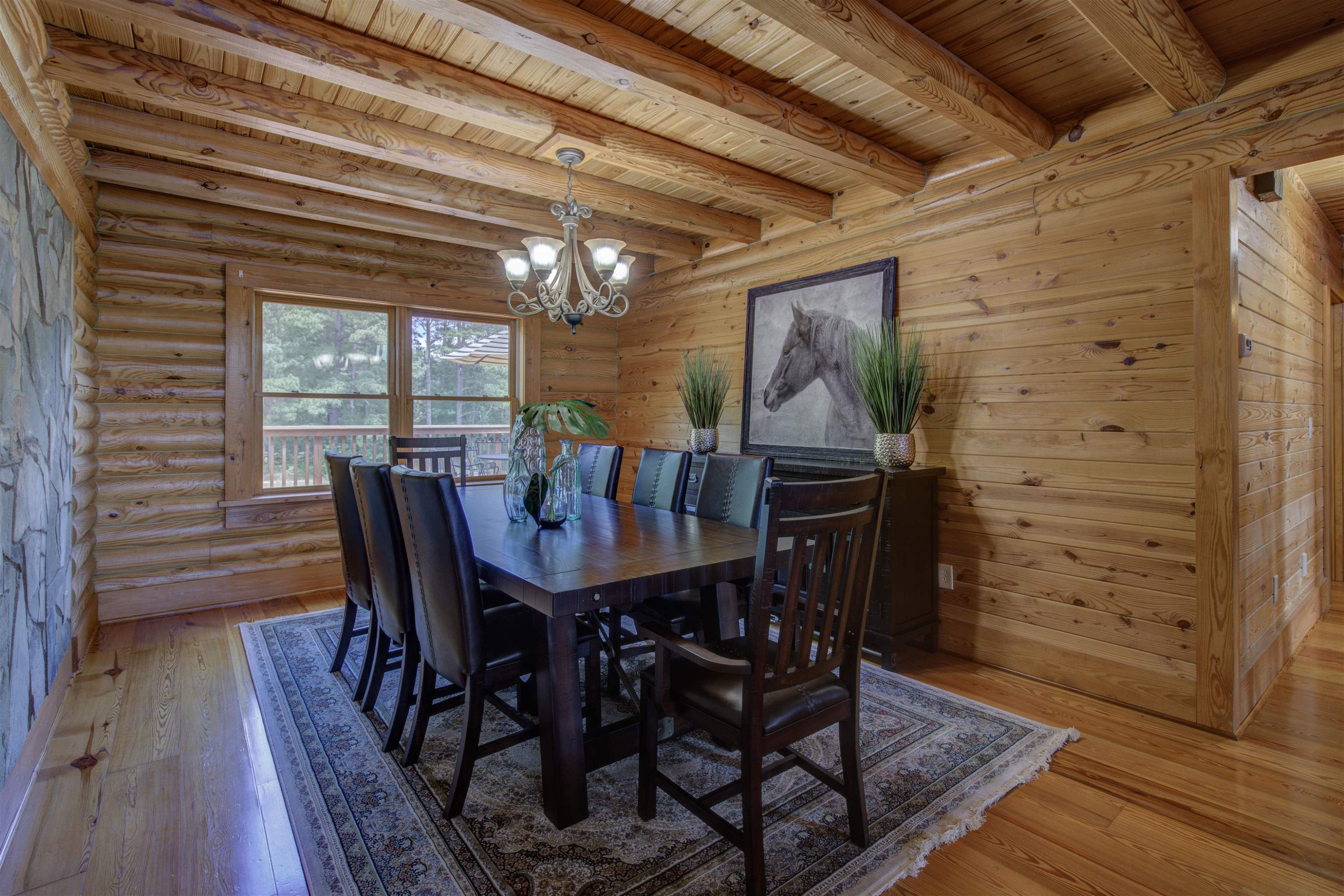 1039 North Chavis Road Kittrell, NC 27544 - Photo 8 of 53 a view of a dining room with furniture and wooden floor