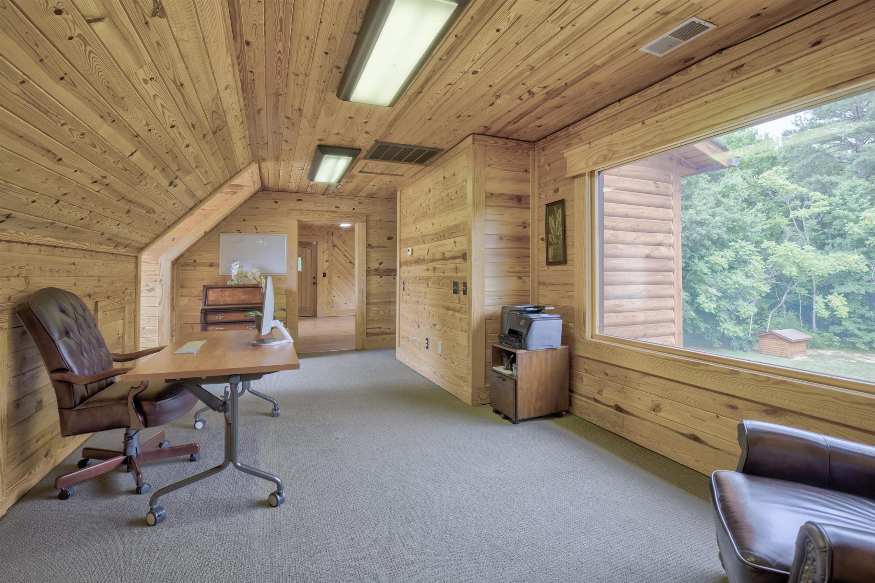 1039 North Chavis Road Kittrell, NC 27544 - Photo 9 of 53 a room with furniture and a window