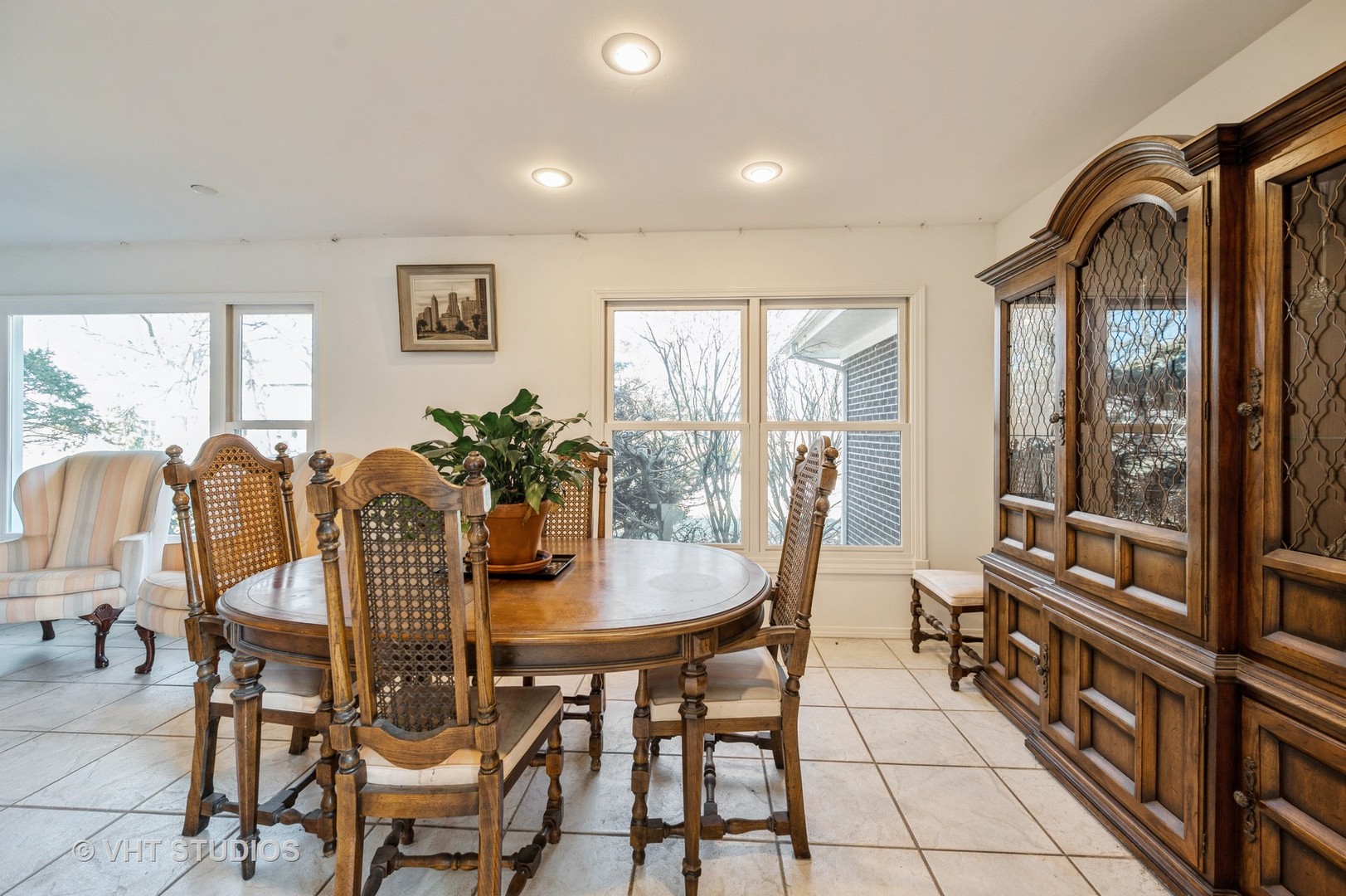 820 Barberry Road Highland Park, IL 60035 - Photo 8 of 13 a dining room with furniture a chandelier and wooden floor