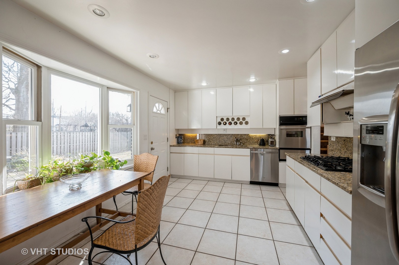 820 Barberry Road Highland Park, IL 60035 - Photo 10 of 13 a kitchen with stainless steel appliances a stove a sink and cabinets