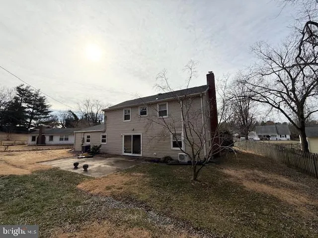 a house view with a backyard space