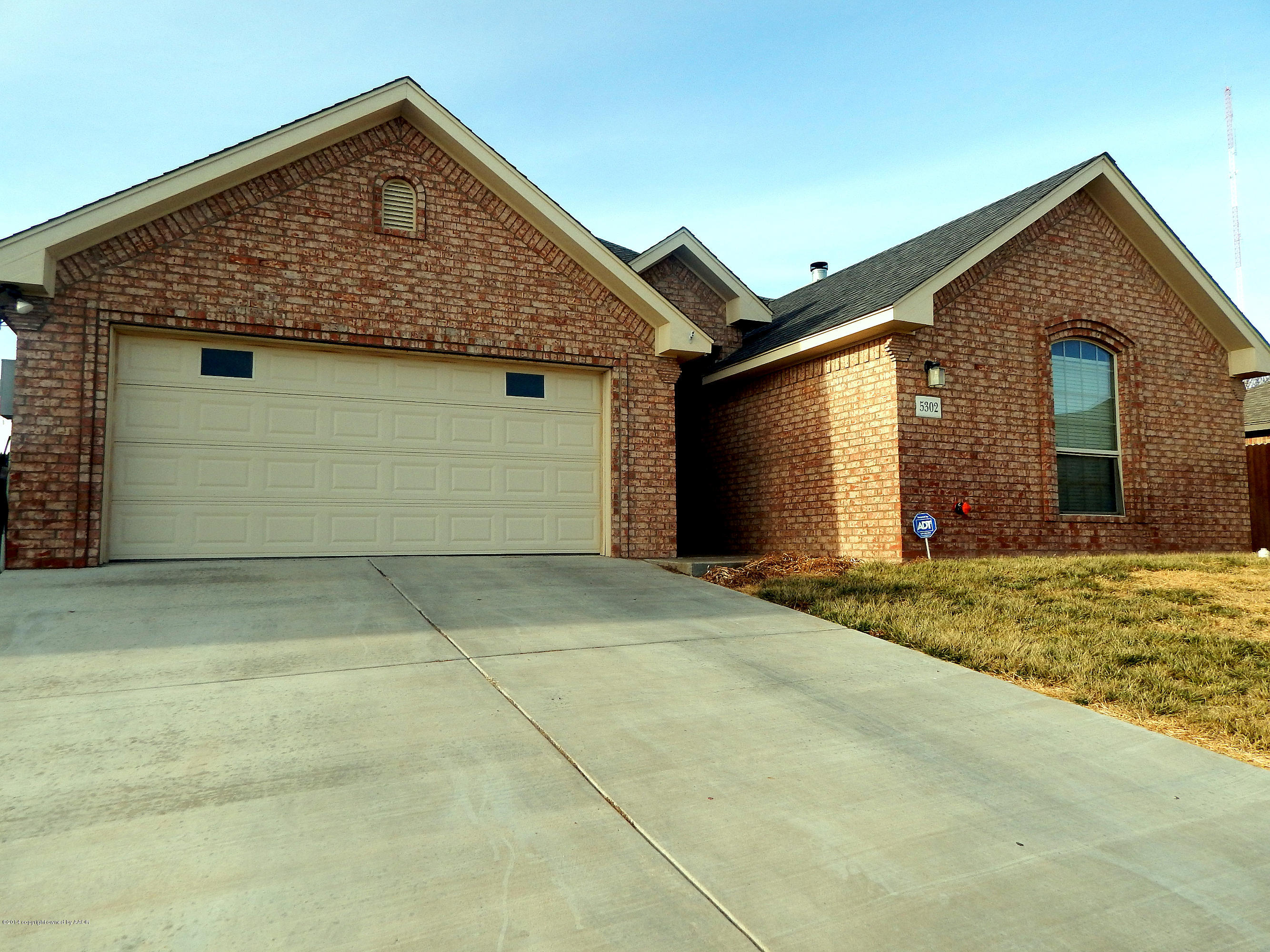5302 Pleasant Court Amarillo, TX 79110 - Photo 2 of 22 a front view of a house with a garage