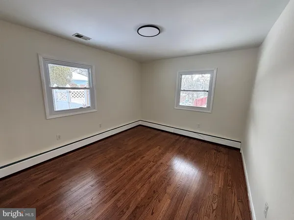 a kitchen with a stove and a sink