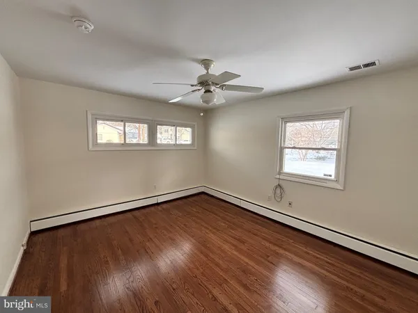 a kitchen with sink and refrigerator