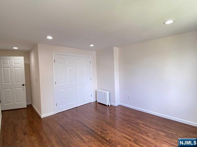 52 Day Street Clifton, NJ 07011 - Photo 13 of 19 a view of an empty room with wooden floor