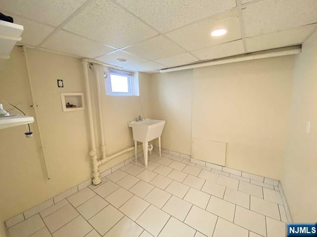 52 Day Street Clifton, NJ 07011 - Photo 16 of 19 a view of a room with wooden floor and chair