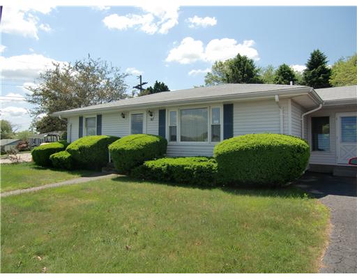 Exterior Front. Easy care vinyl siding and new windows throughout.