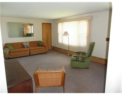 167 Durfee Road Tiverton, RI 02878 - Photo 3 of 9 Living Room. Large living room off the kitchen.