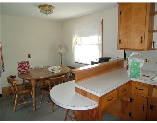 167 Durfee Road Tiverton, RI 02878 - Photo 4 of 9 Kitchen. Retro kitchen with eating area and working appliances.