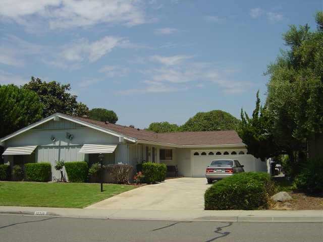 12710 Rios Road San Diego, CA 92128 - Photo 1 of 1 front view of a house with a yard