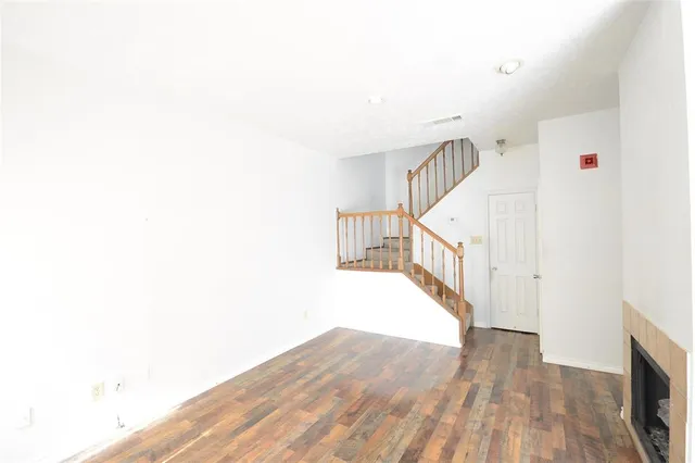 a view of entryway with wooden floor