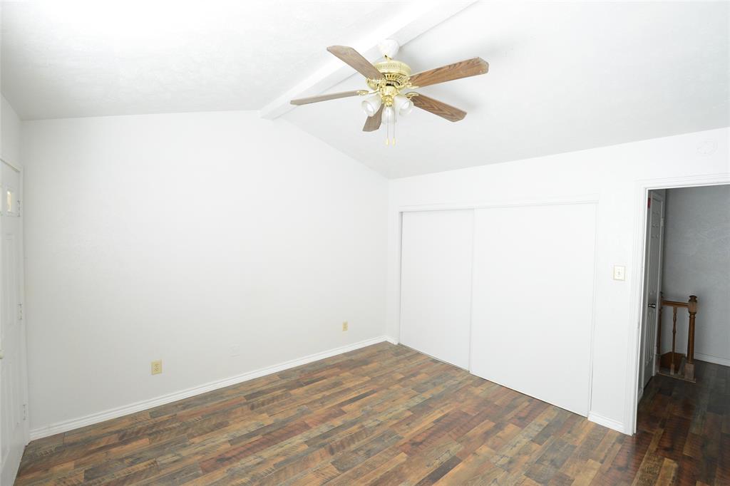 501 Arbor Creek Drive, Unit 204 Euless, TX 76039 - Photo 19 of 22 a view of a room with wooden floor