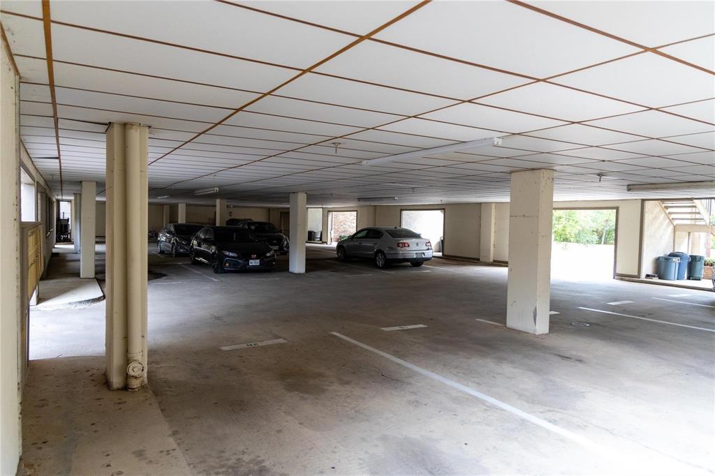 501 Arbor Creek Drive, Unit 204 Euless, TX 76039 - Photo 2 of 22 a view of parking area