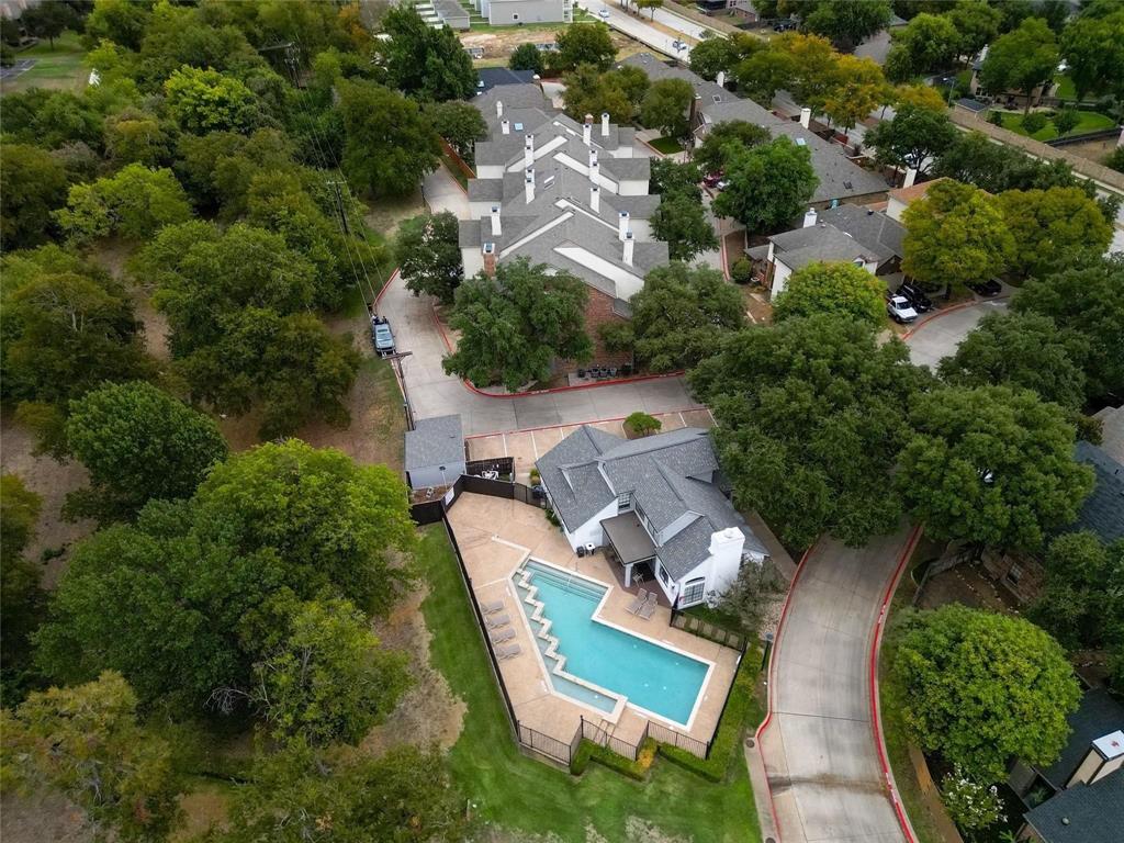 501 Arbor Creek Drive, Unit 204 Euless, TX 76039 - Photo 9 of 22 an aerial view of a house with a yard and lake view