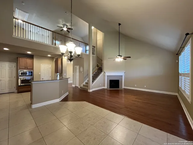 a view of a livingroom with a kitchen