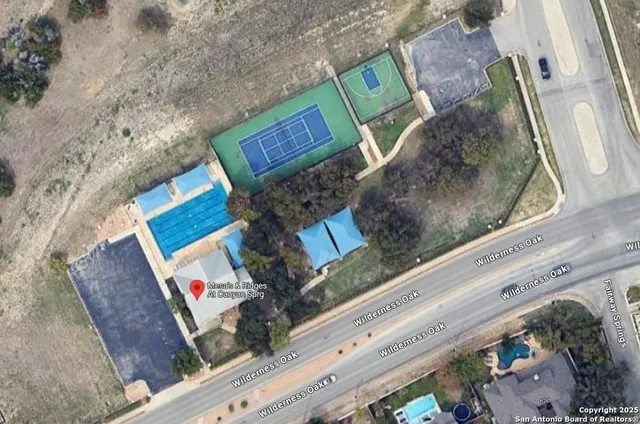 a swimming pool with outdoor seating and yard