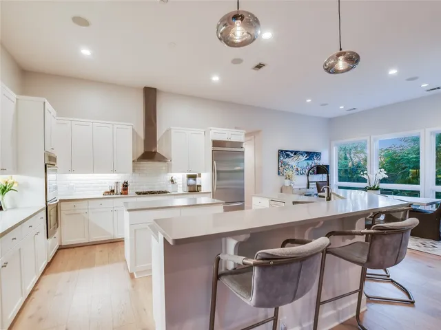 a kitchen with a stove and a sink