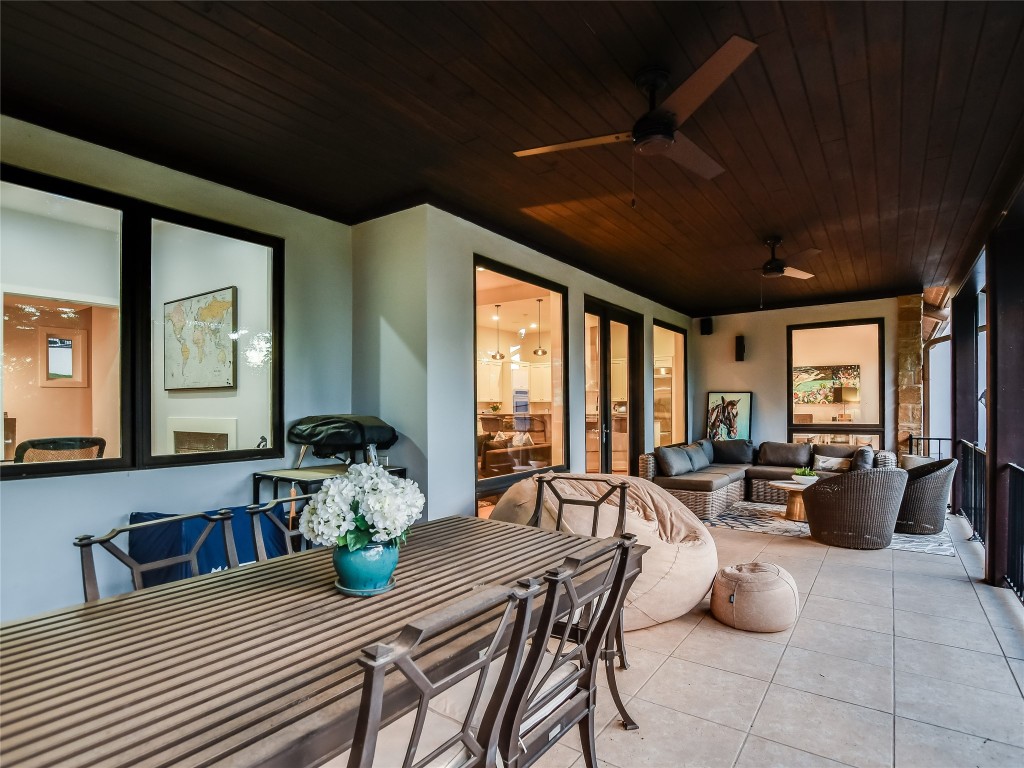4704 Monte Carmelo Place Austin, TX 78738 - Photo 28 of 30 a view of a dining room with furniture window and outside view