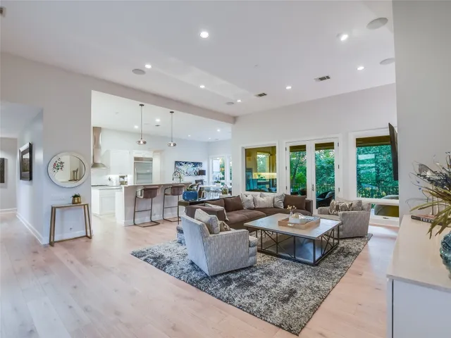 a living room with furniture and a table