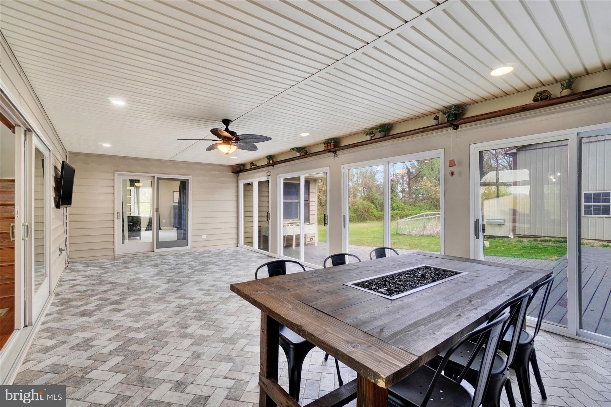 1685 Bahns Mill Road Windsor, PA 17366 - Photo 23 of 75 Sunroom, access to primary bedroom, deck & laundry