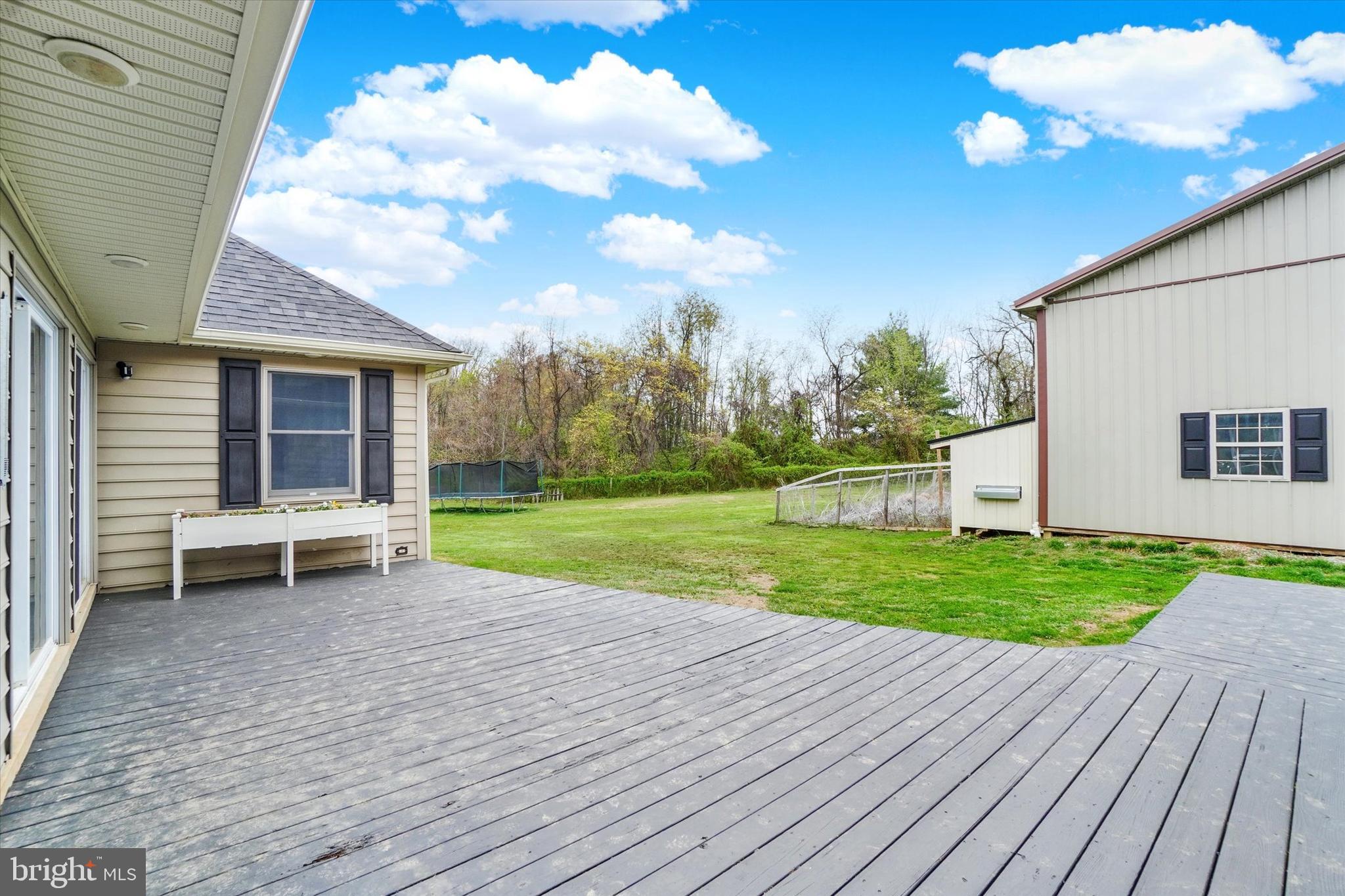 1685 Bahns Mill Road Windsor, PA 17366 - Photo 61 of 75 Deck off of garage & sunroom