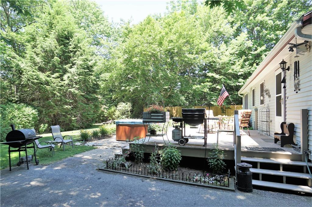 286 Gray Road Windham, ME 04062 - Photo 22 of 30 Back yard with deck, hot tub and...
