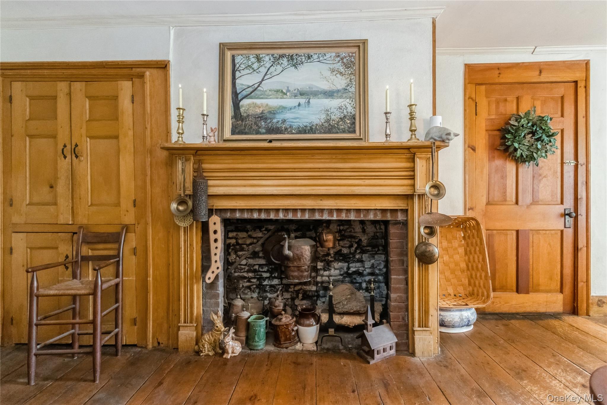 93 Widmer Road Wappingers Falls, NY 12590 - Photo 13 of 45 Dining Room fireplace with cauldrons. Addl closed