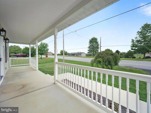 a view of a porch with a yard