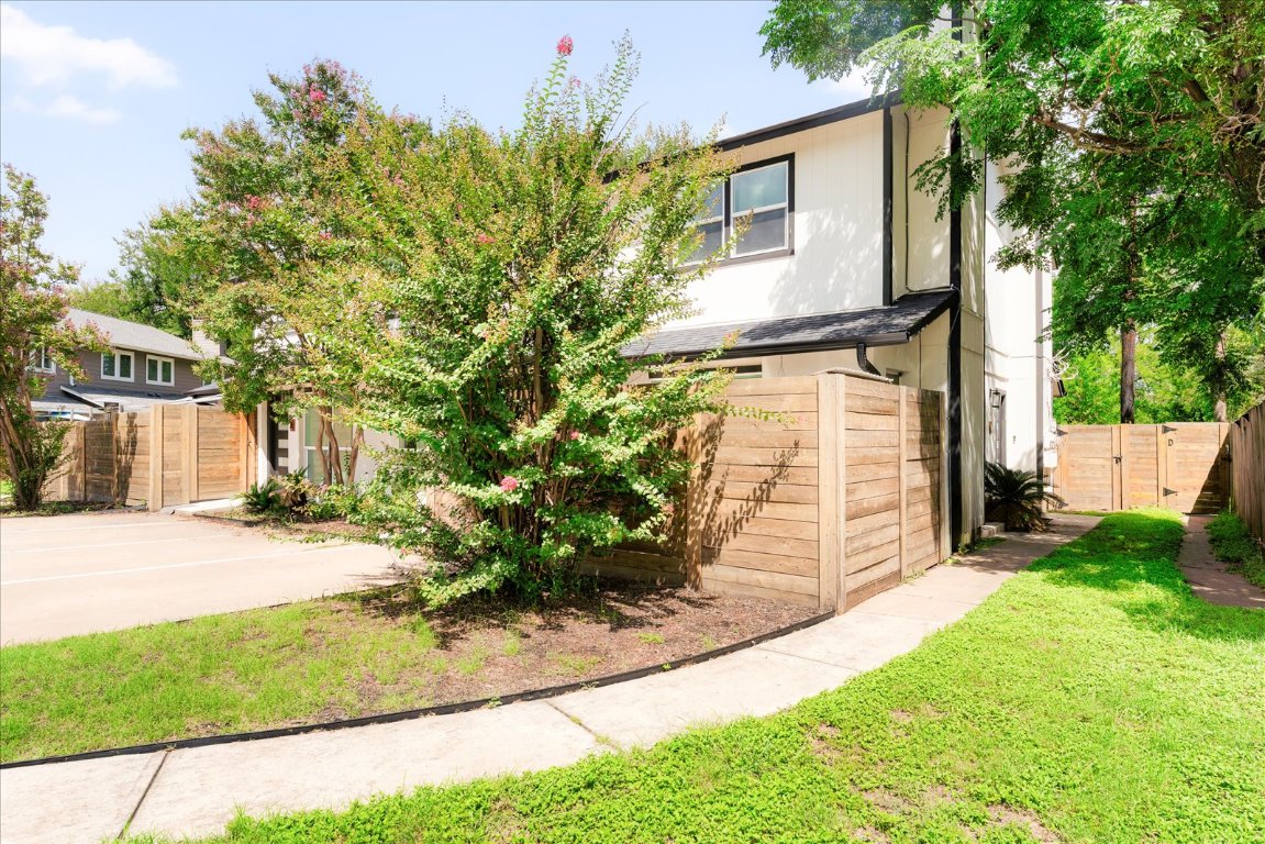 1511 Camp Craft Road, Unit D West Lake Hills, TX 78746 - Photo 11 of 29 a front view of a house with garden