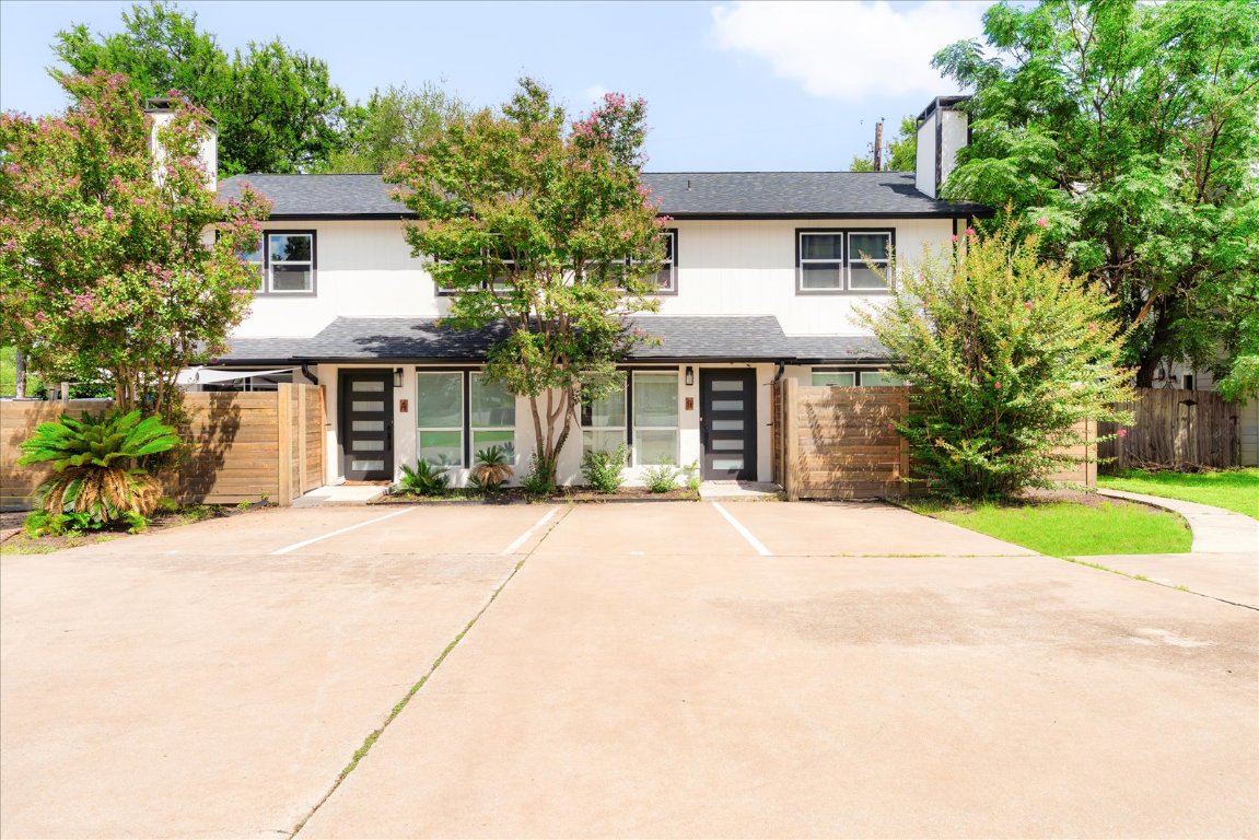 1511 Camp Craft Road, Unit D West Lake Hills, TX 78746 - Photo 10 of 29 front view of a house with a yard