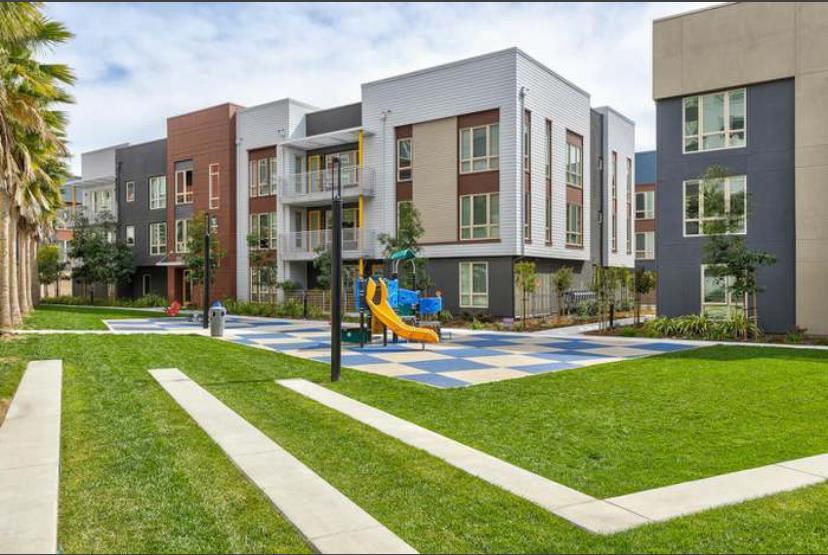 1625 Delano Street, Unit 21 Milpitas, CA 95035 - Photo 13 of 14 a view of a building with a swimming pool