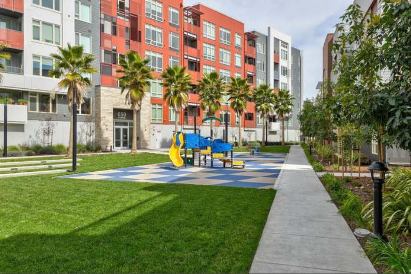 1625 Delano Street, Unit 21 Milpitas, CA 95035 - Photo 14 of 14 a front view of building with yard