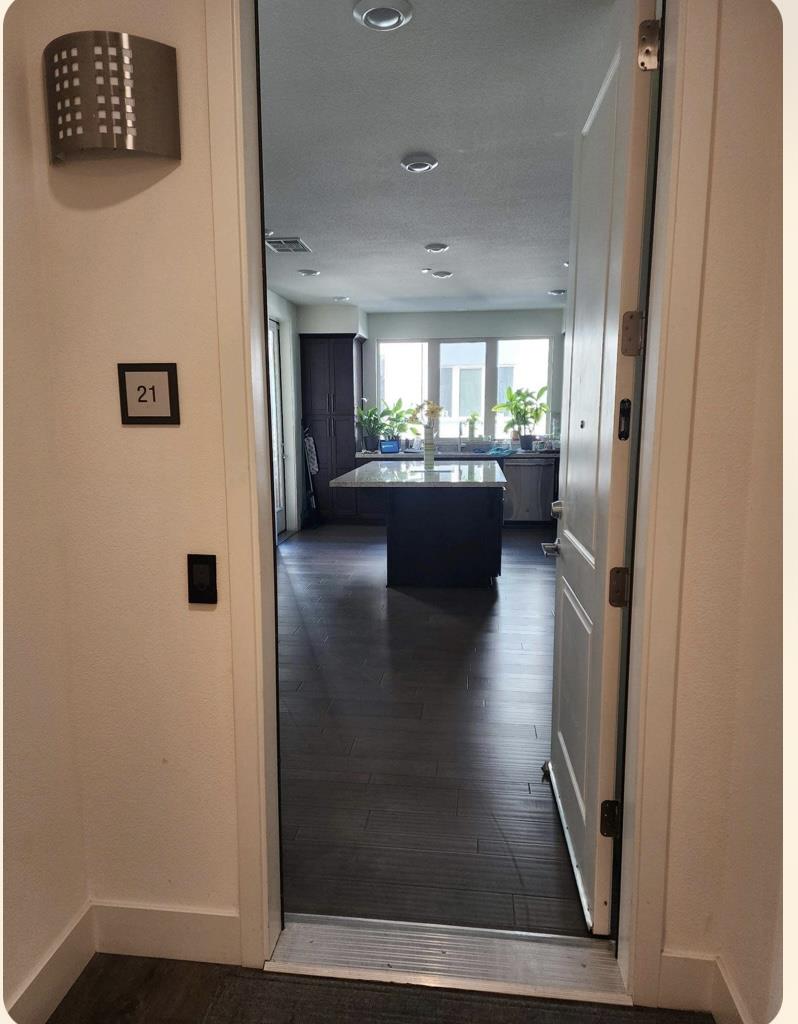 1625 Delano Street, Unit 21 Milpitas, CA 95035 - Photo 2 of 14 a view of a hallway with seating area