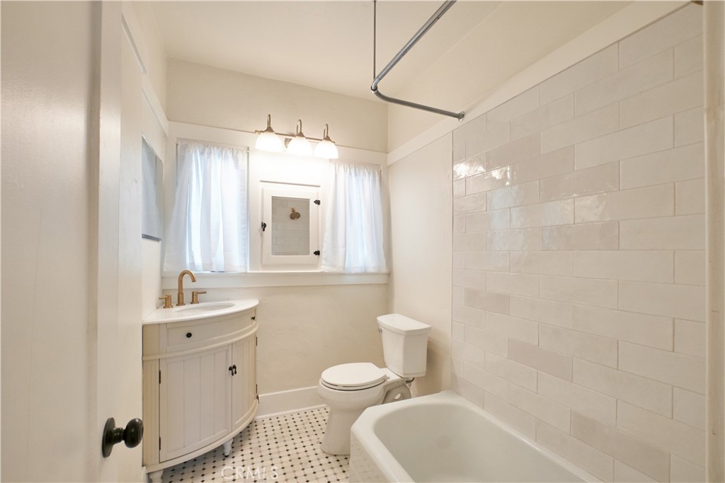 3045 Cedar Street Riverside, CA 92501 - Photo 12 of 25 Bathroom new tile, new toilet, new sink, faucets