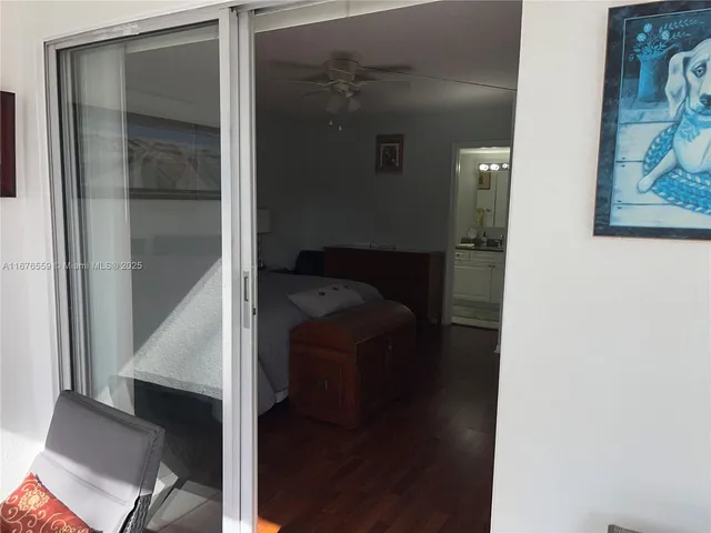 a view of a lake with houses in the background