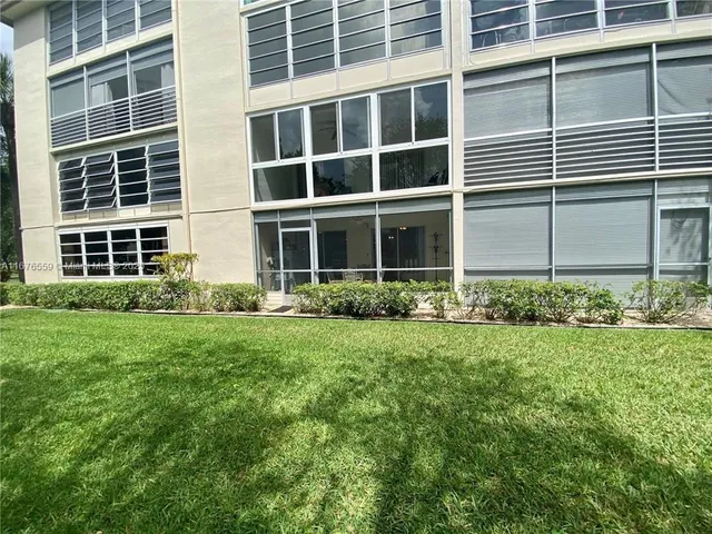 a view of a garden with trees