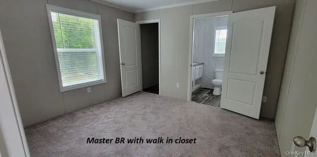 a view of a room that has a window in it