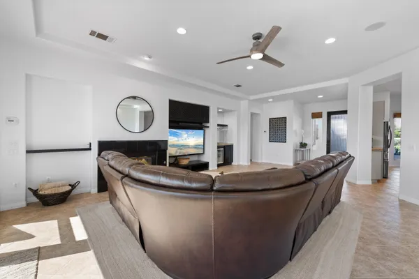 a kitchen with stainless steel appliances granite countertop a stove and a microwave