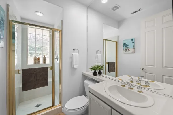 a view of a yard and front door of the house