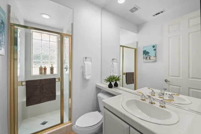 a view of a yard and front door of the house