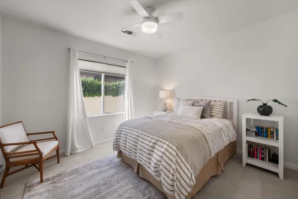 an aerial view of a house with a ocean view