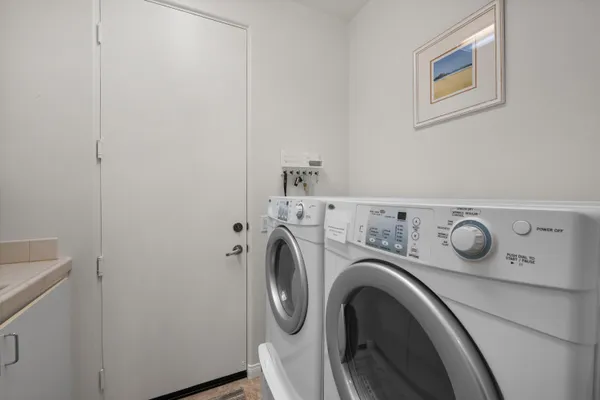 an aerial view of a house with a lake view and a mountain view