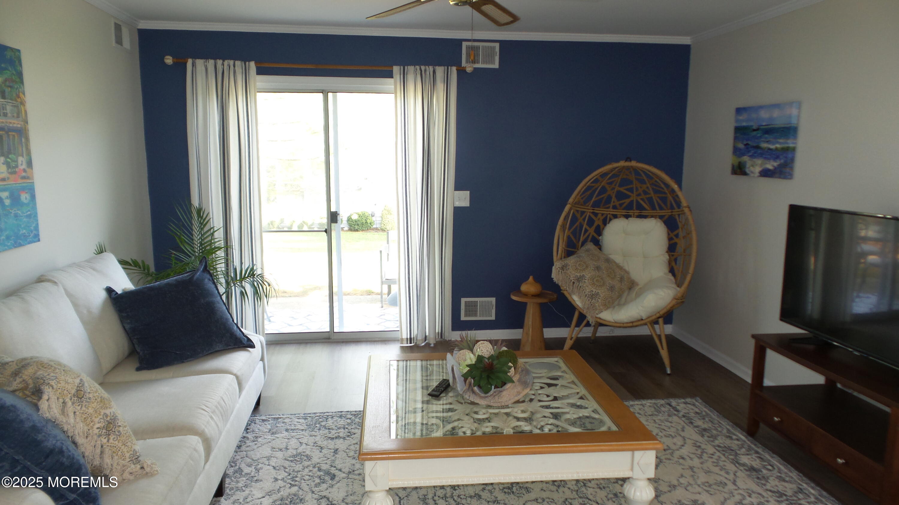 4 Olympus Way Brick, NJ 08724 - Photo 18 of 39 a living room with furniture a rug and a window