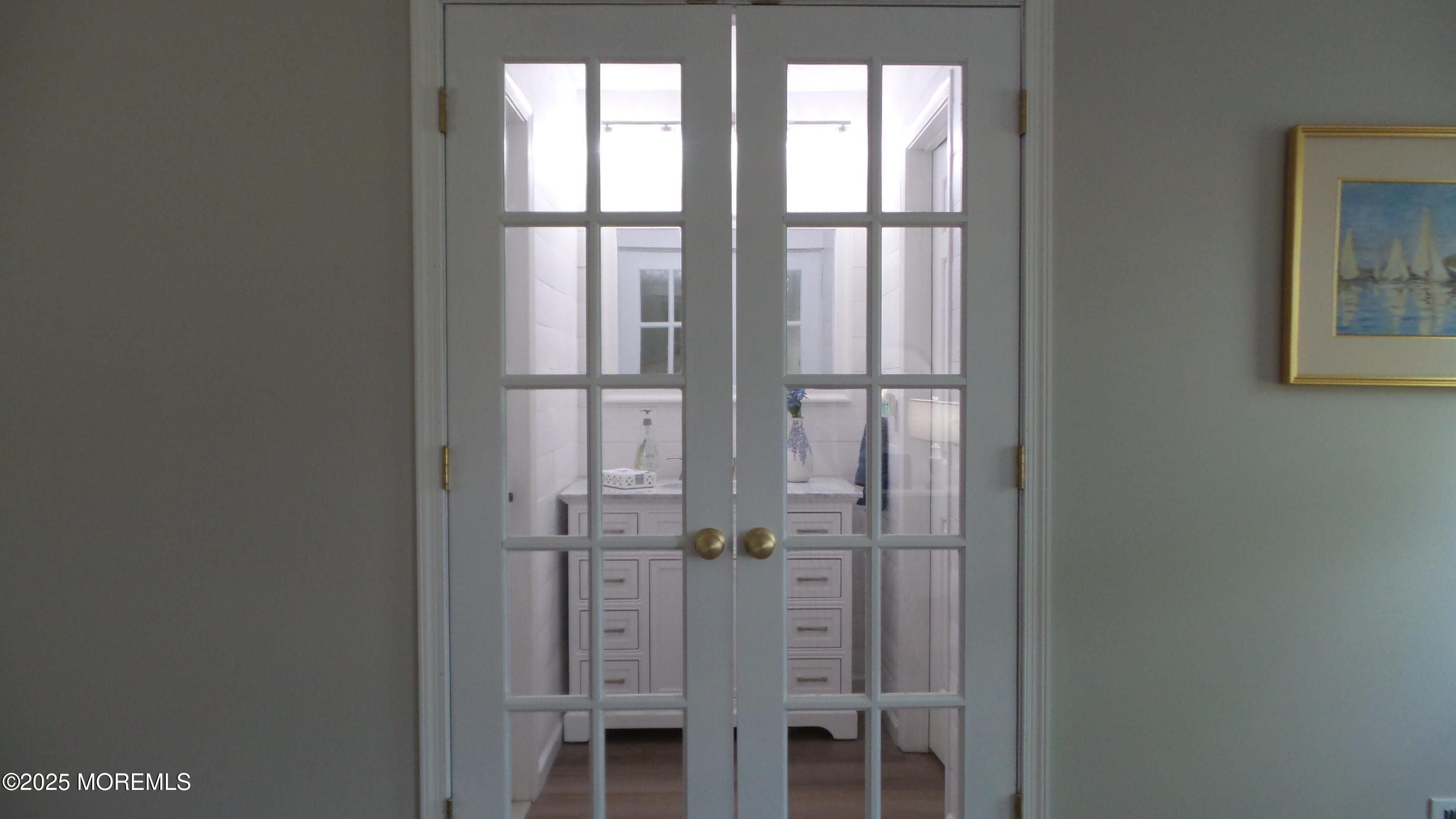 4 Olympus Way Brick, NJ 08724 - Photo 23 of 39 a bathroom with a glass shower door