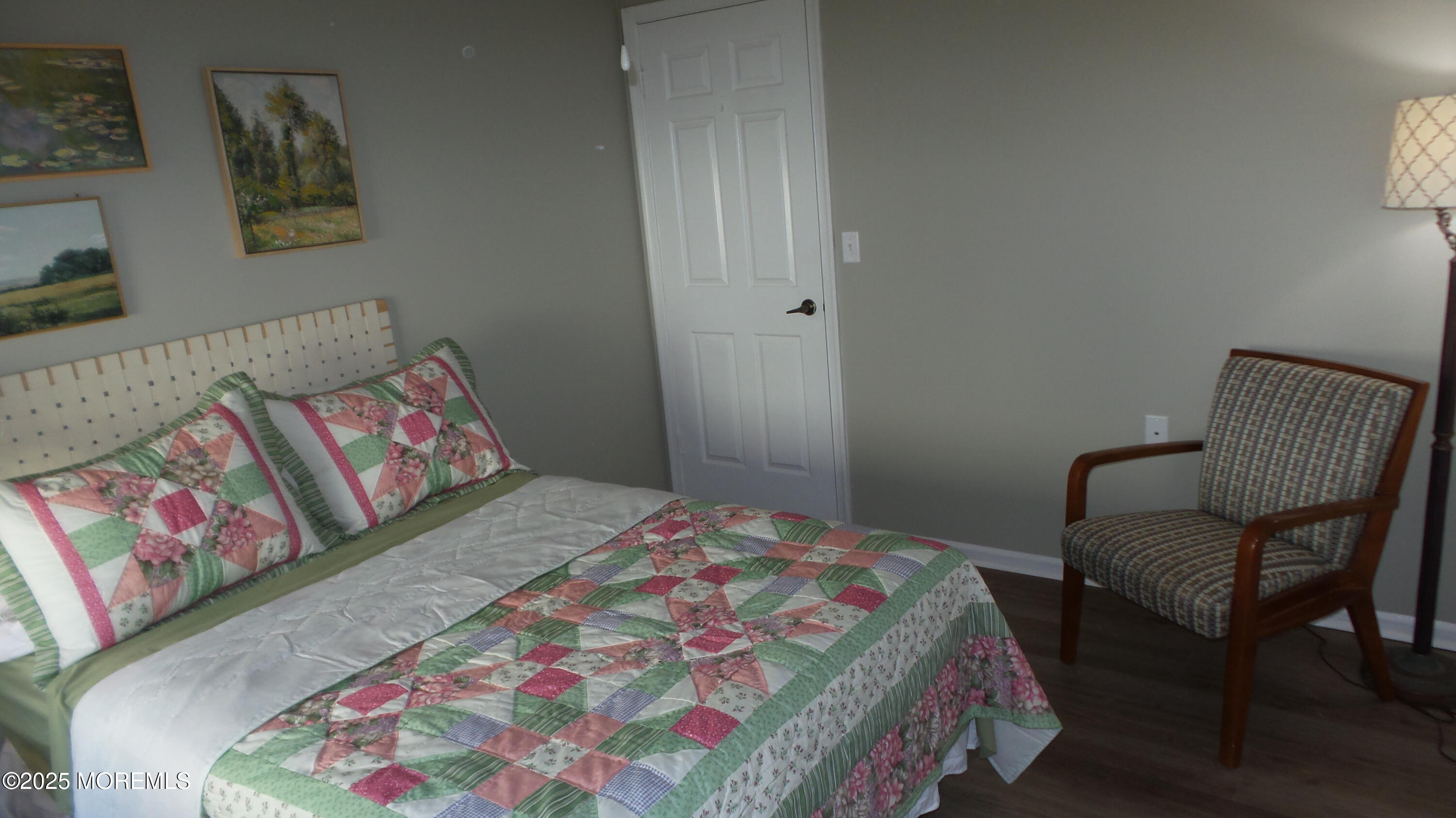 4 Olympus Way Brick, NJ 08724 - Photo 29 of 39 a bedroom with a bed and a chair