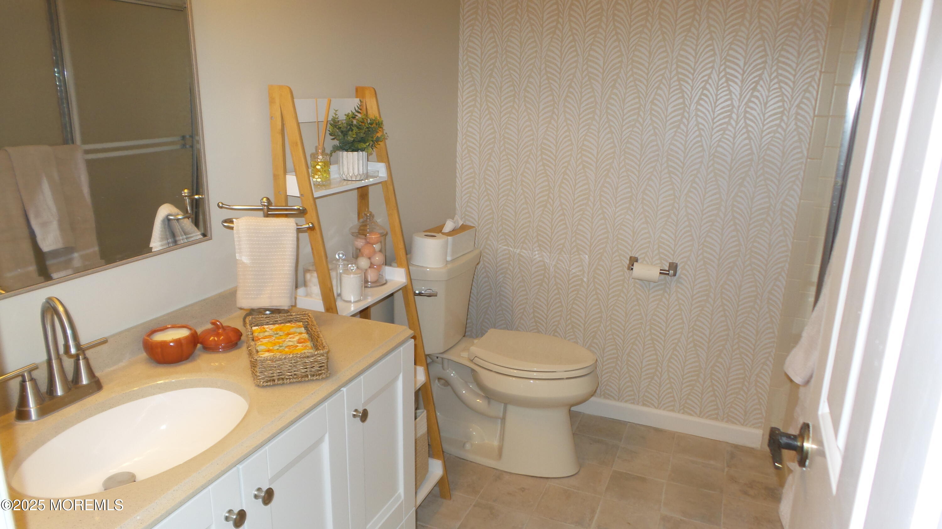 4 Olympus Way Brick, NJ 08724 - Photo 32 of 39 a bathroom with a granite countertop sink mirror vanity and toilet