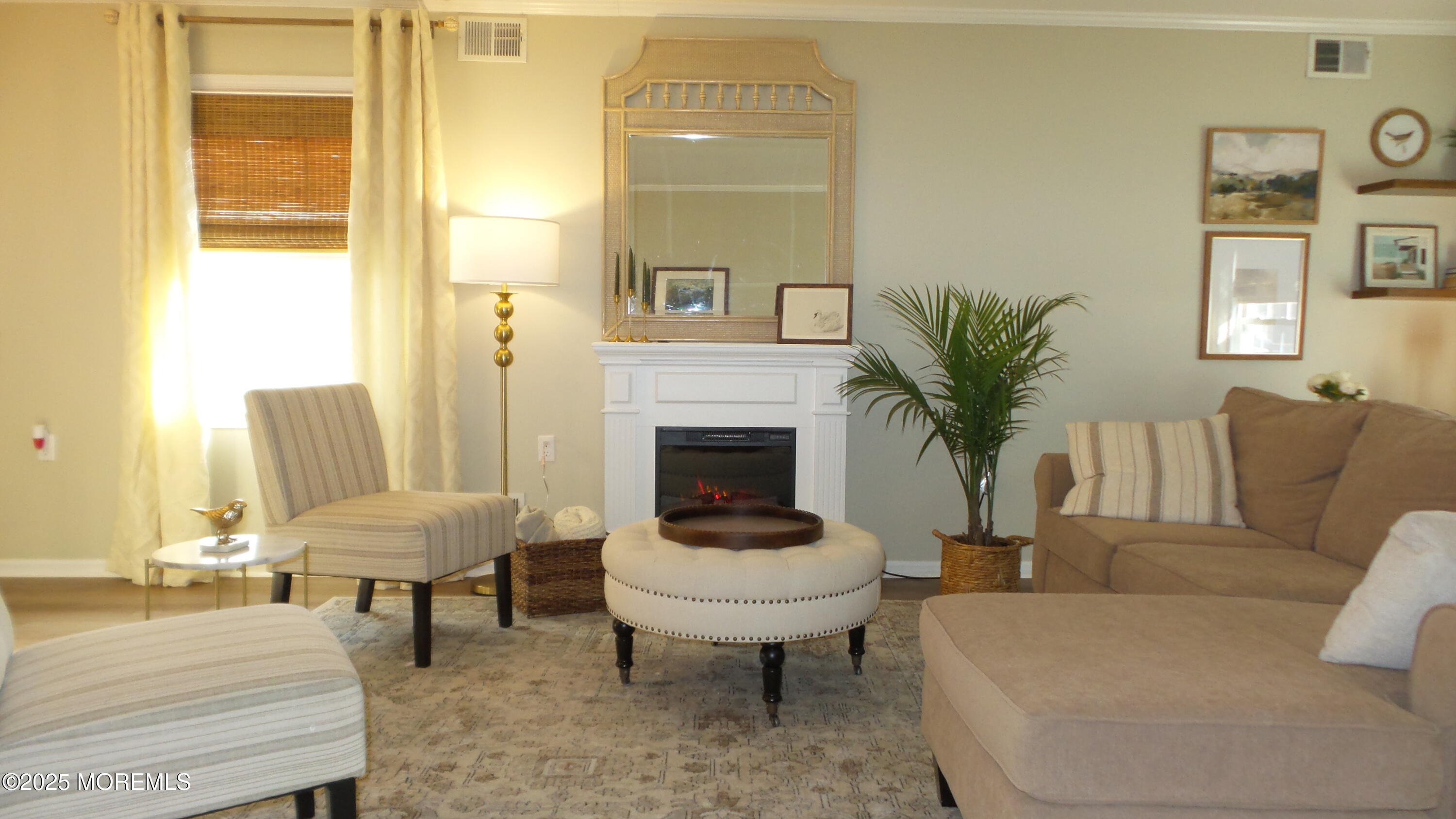 4 Olympus Way Brick, NJ 08724 - Photo 8 of 39 a living room with furniture and a large window