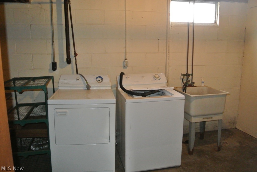 939 Nevin Street Akron, OH 44310 - Photo 22 of 23 Clothes washing area with sink and washing machine and dryer